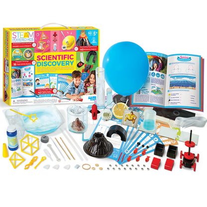 Scientific discovery kit set with blue balloon, open booklet, and assorted experiment pieces