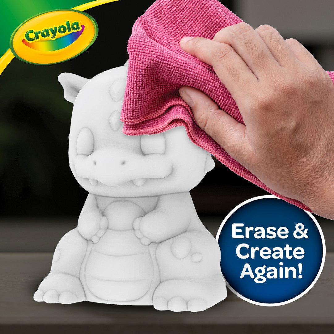 White Light-Ups dragon figure with hand erasing using a cloth