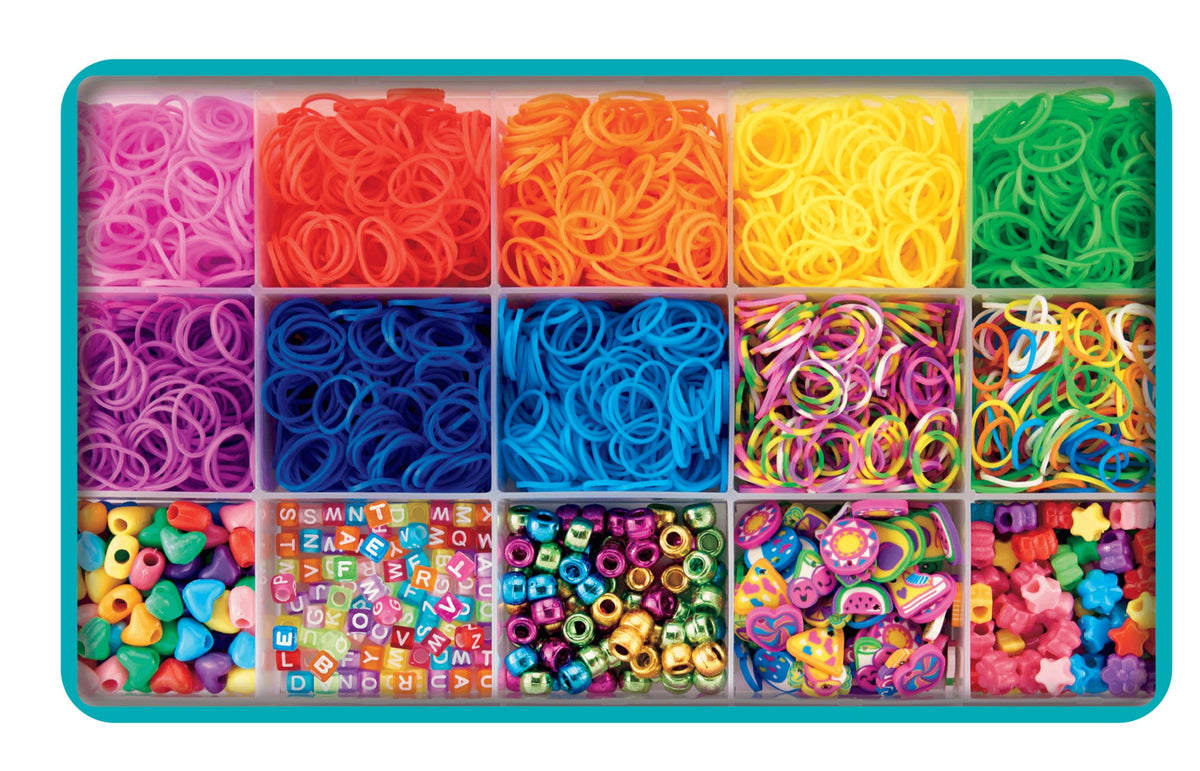 Colorful rubber bands arranged in a rainbow tray for loom jewelry