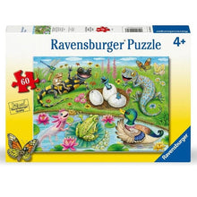 Jigsaw puzzle box featuring colorful hatchlings, frogs, geckos, butterflies, and 60-piece badge