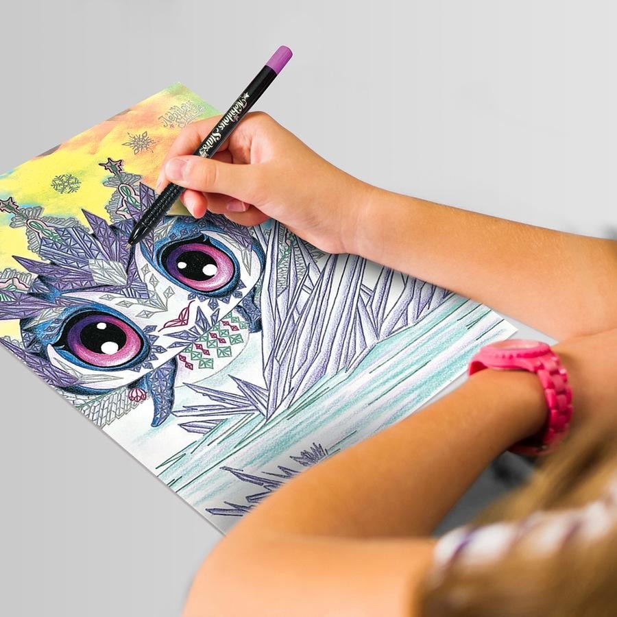 Person drawing with a purple pencil on patterned character paper from the sketchbook set