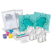Unicorn mould and paint kit with teal moulds, white unicorn pieces, and paints