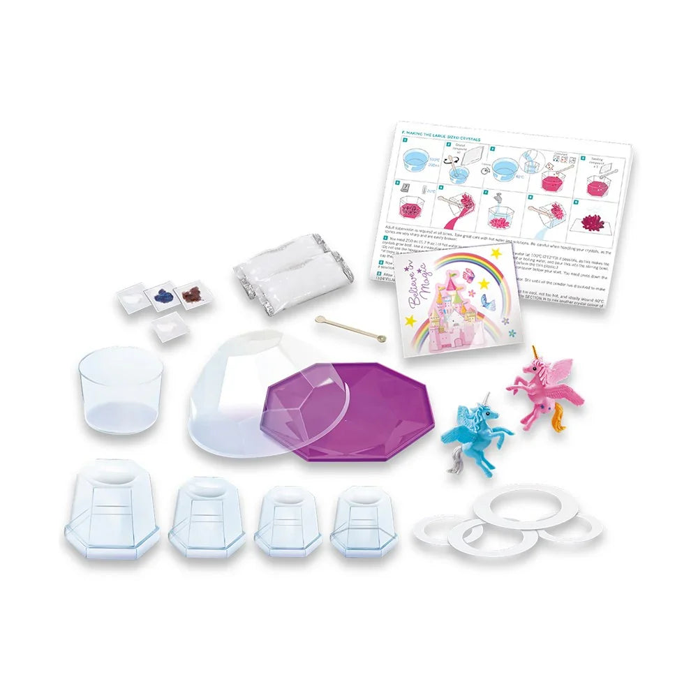Unicorn crystal terrarium kit contents: molds, crystals, unicorn figurines, and instruction sheet