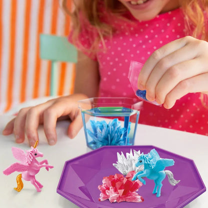 Purple faceted crystal terrarium tray with blue and pink unicorn figures and crystals