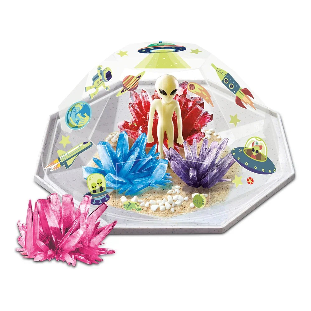 Clear octagonal terrarium with alien figure and blue, purple, pink crystal clusters