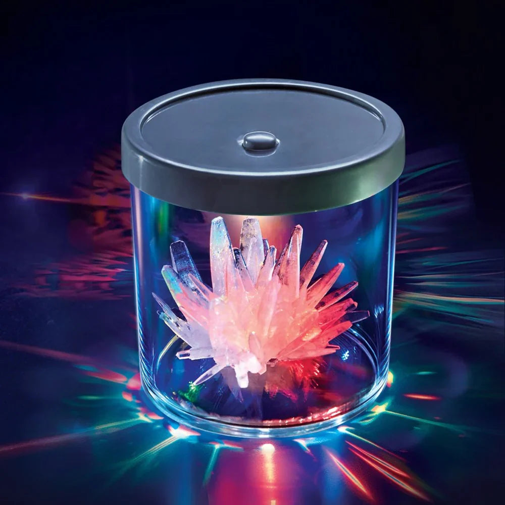 Color-changing crystal growing display case with glowing glass cylinder and lid