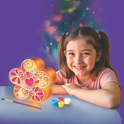 Child using a glowing flower lamp with colorful LED light and paint pens