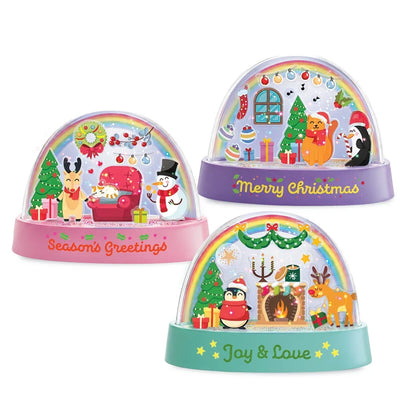 Set of three colorful Christmas snow domes with scene decorations