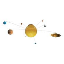 Solar system ceiling mobile with large yellow sun and small planet spheres
