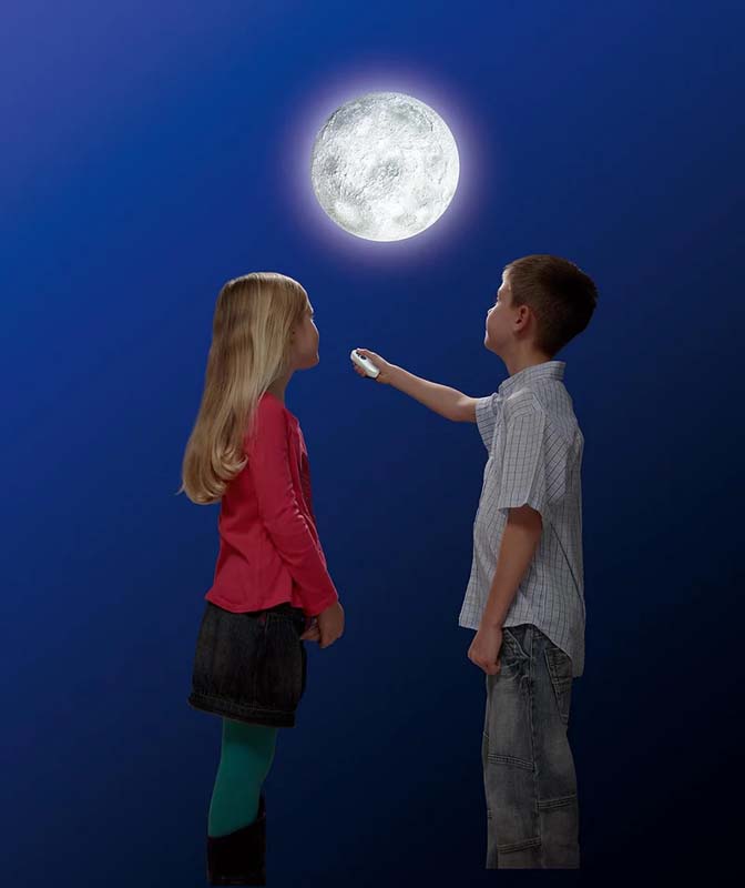 Glowing moon light toy with remote, held by children
