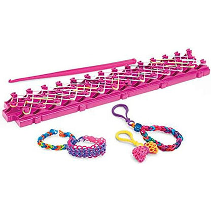 Pink rubber band loom with multi-color charm bracelets and rubber bands