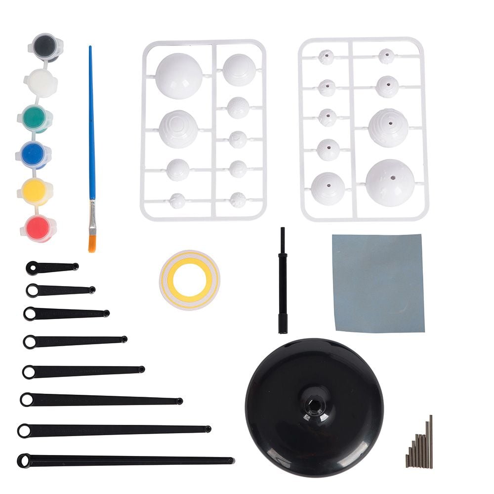Solar system kit parts: planet pieces, rods, stickers, and paint accessories