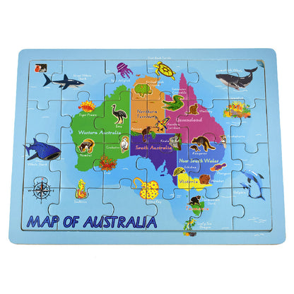 Map of Australia jigsaw puzzle with colorful pieces and oceans, labeled "MAP OF AUSTRALIA"