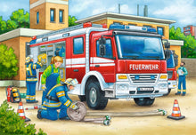 Fire truck jigsaw puzzle artwork with firefighters and child near hoses